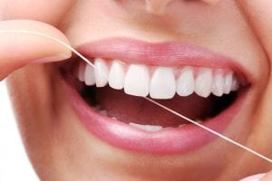 Como criar o hábito de usar fio dental?